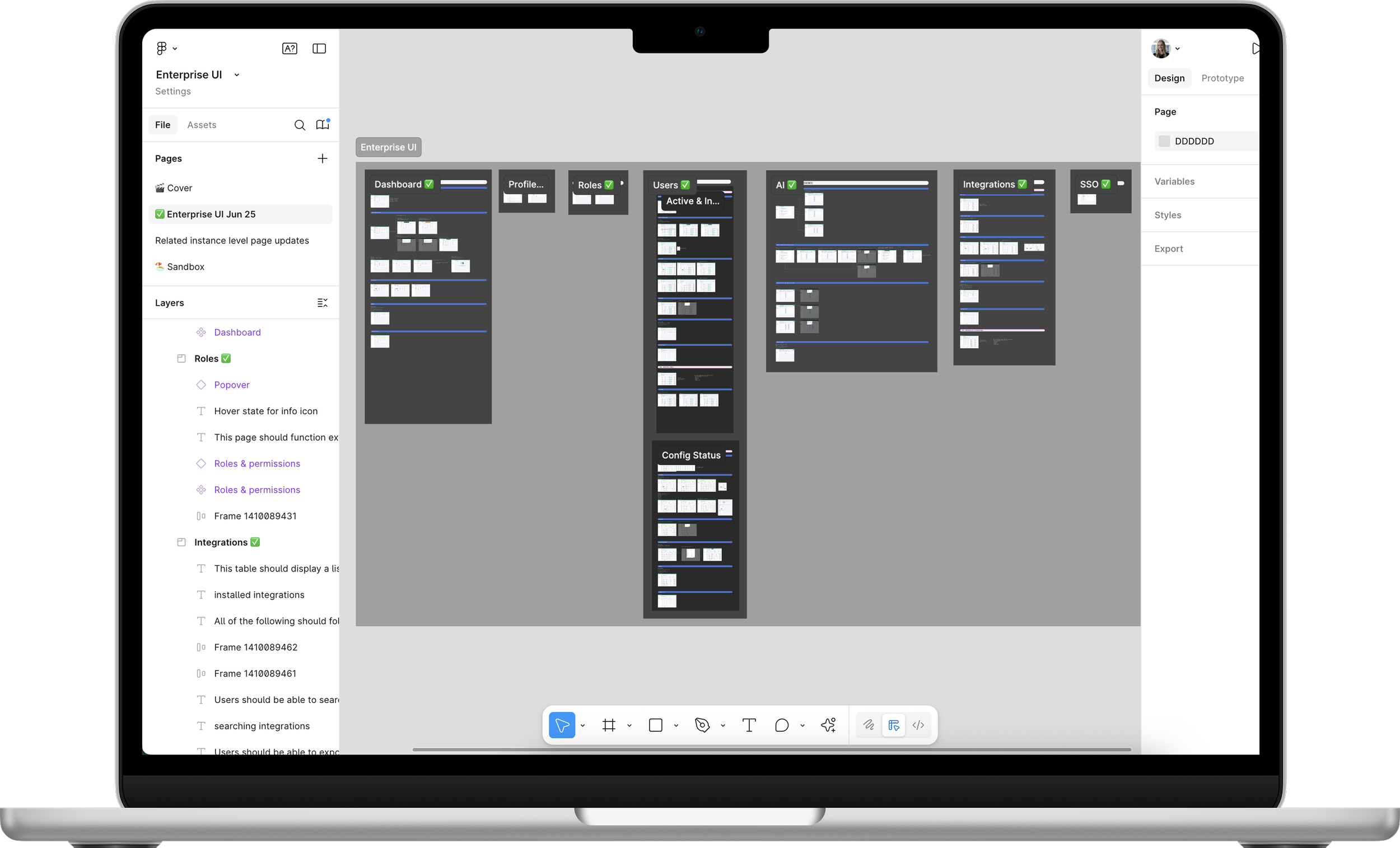 A MacBook displaying the Figma file containing the project's screen designs