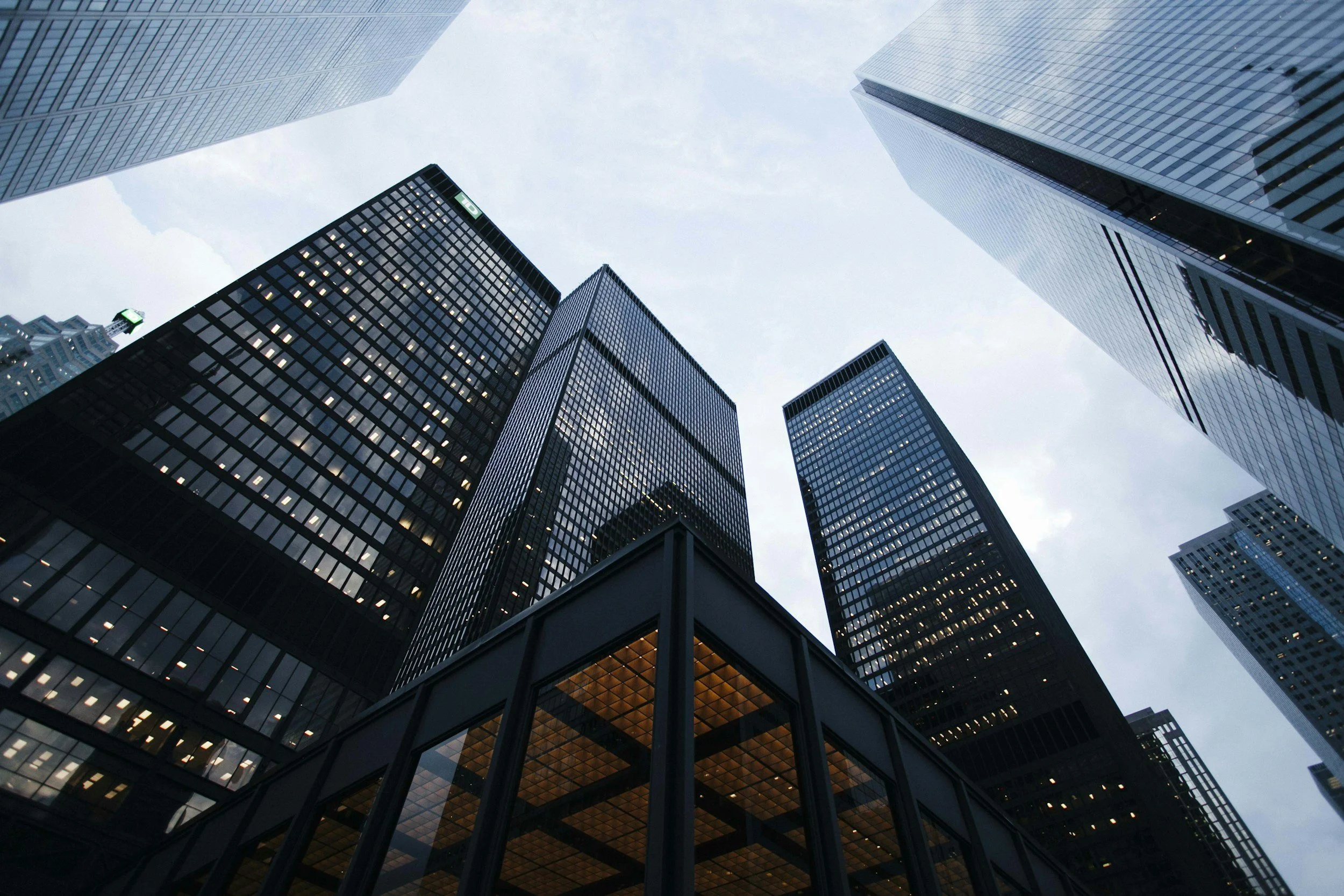 Glass office towers seen from street level — The Enterprise case study